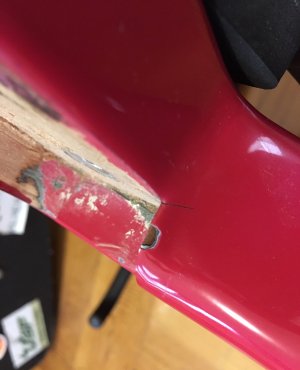 Strat neck pocket finish crack.jpg