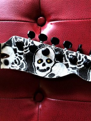 Skully eyeballs headstock.JPG