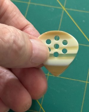 *apollo custom canyon-stone pick in hand.jpg