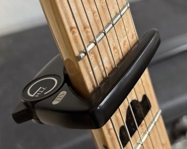 g7th capo on guitar.jpg