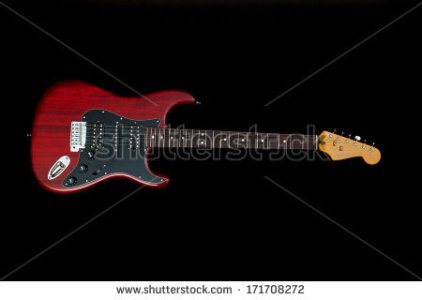 stock-photo-zagreb-croatia-january-fender-stratocaster-red-electric-guitar-on-black-background...jpg