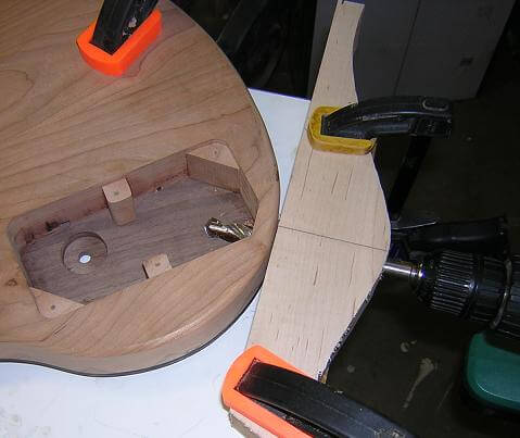 78-DrillingTheOutputJackHole.JPG