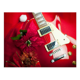 red_electric_guitar_with_christmas_ornaments_postcard-rb5f8582ae2ce4333845c597c1e5fcdb0_vgbaq_8byvr_324.jpg